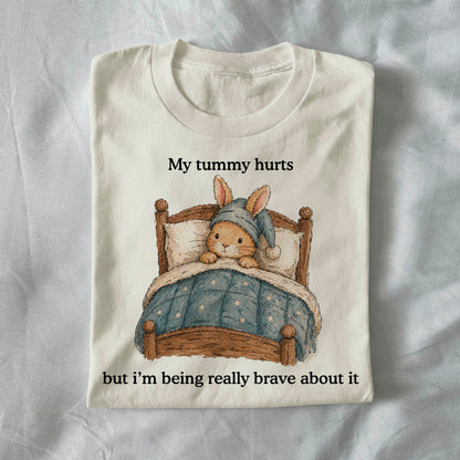 My tummy hurts but im being really brave about it